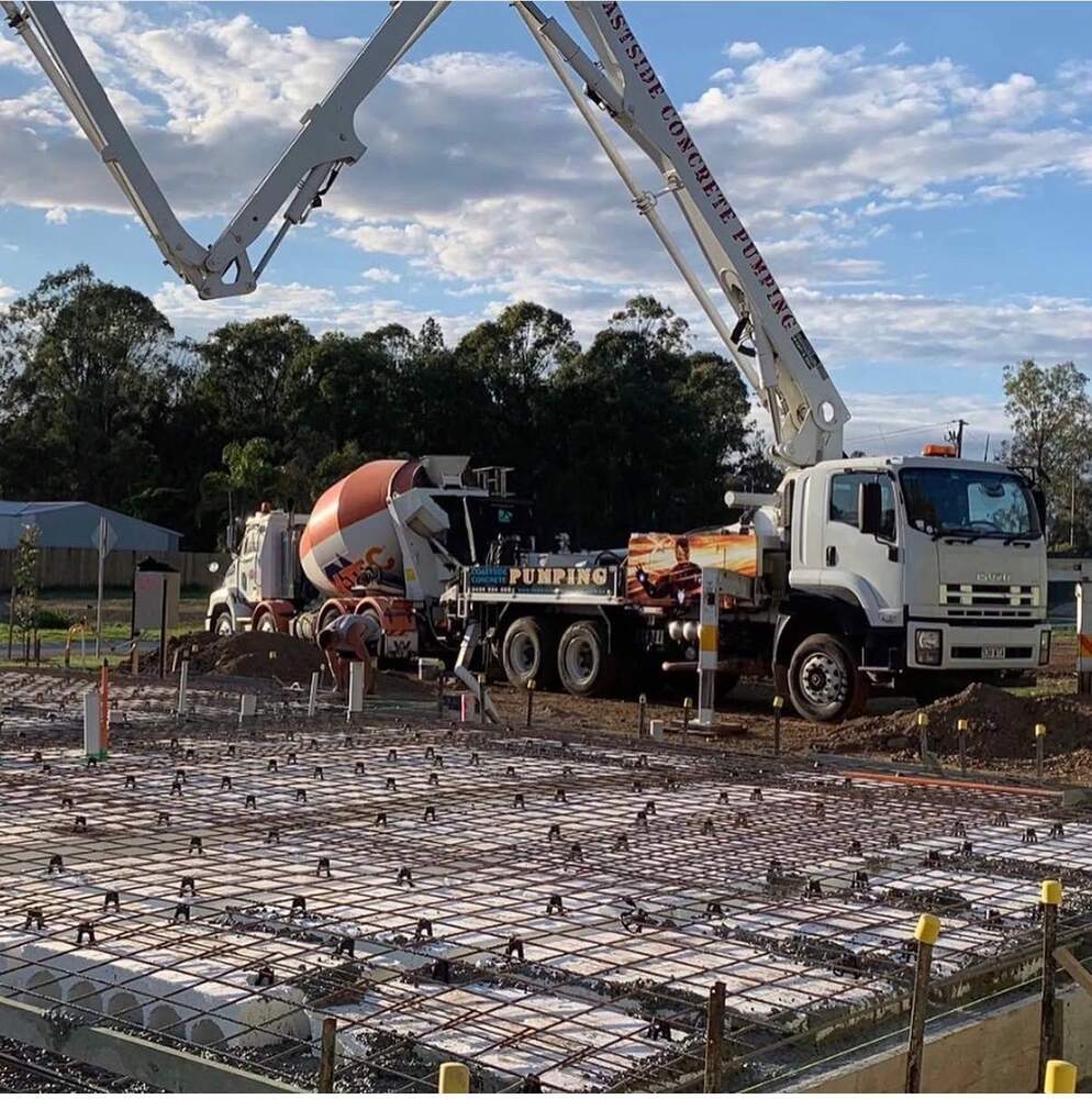 Coastside double pump truck pour commercial slab