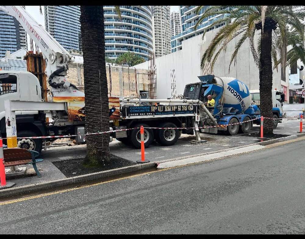 Coastside pump truck on commercial site Surfers Paradise towers