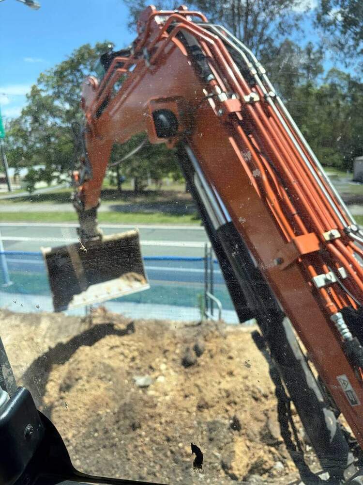 Excavator working on site
